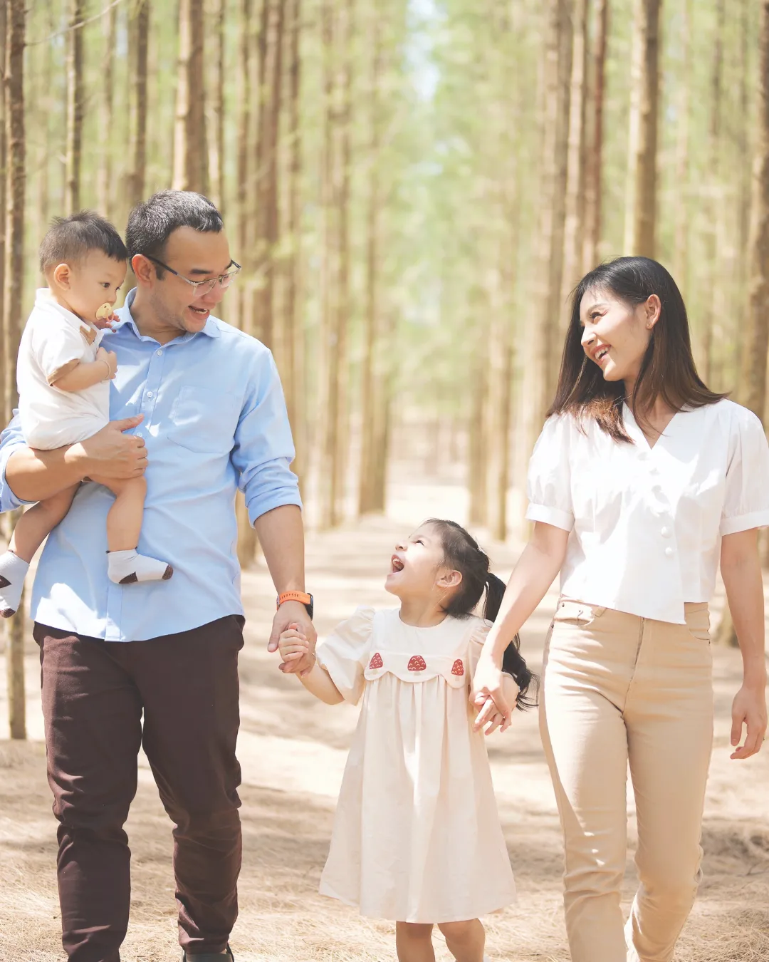 A family enjoying a nature-based wellness retreat, embracing multi-generational travel focused on well-being and mindfulness.